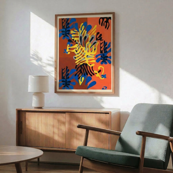 Matisse-inspired abstract poster displaying mimosa blossoms and foliage as joyful, flowing paper cutout forms in a harmonious palette of deep reds, bright oranges, golden yellows, and rich blues.