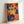 Framed Matisse-style poster displaying playful botanical cutout shapes in warm and cool colors, creating a joyful, dynamic abstract composition.