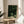 Sage green foliage study with black accents displayed as a framed poster, embodying calm, contemplative Wabi Sabi aesthetics.