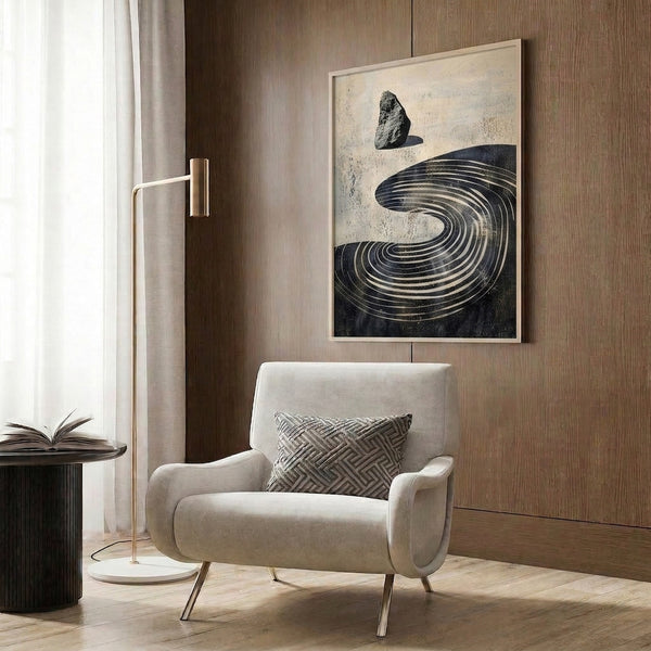 Modern wall art print of balanced stone rocks in spiral form with wave-like elements, black and gold accents on cream background, zen aesthetic.
