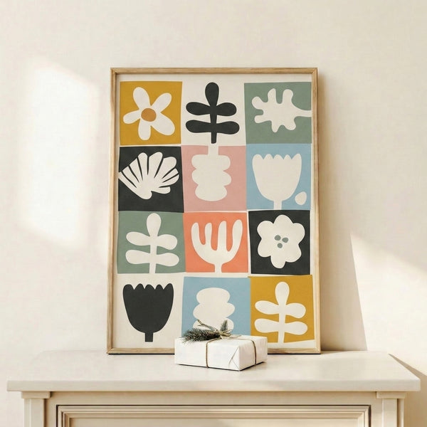 Framed poster with geometric botanical composition combining tulips and leafy shapes in a cheerful palette of dusty green, coral, and cream.