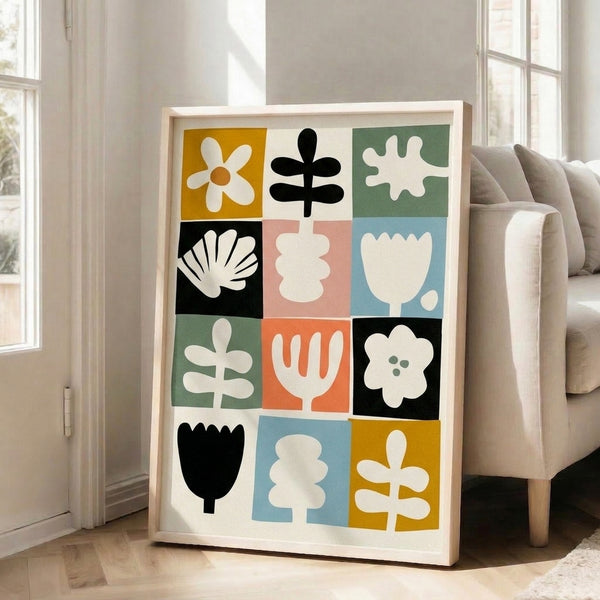 Minimalist flower grid art print featuring abstract botanical motifs in golden yellow, soft blue, and charcoal black with mid-century aesthetic.