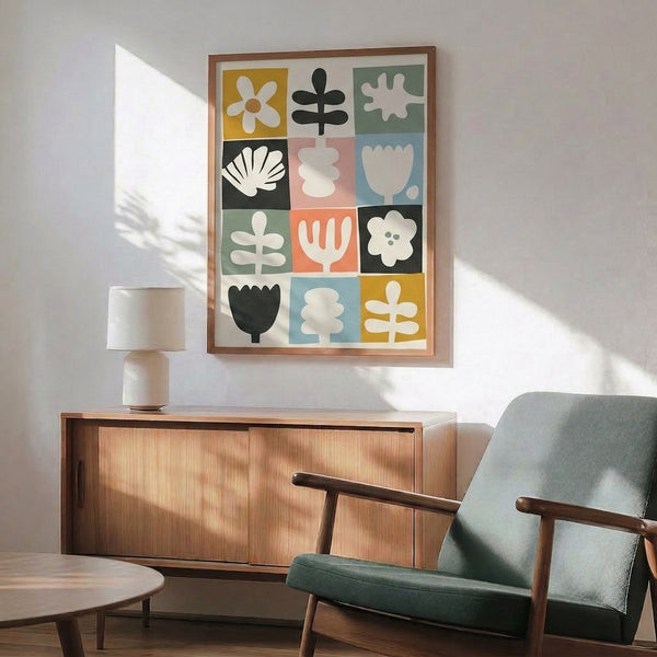 Mid-century modern flower poster with cheerful arrangement of geometric botanical forms in golden yellow, dusty green, and soft blue tones.