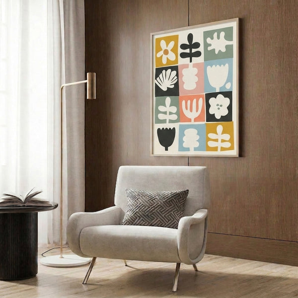 Framed minimalist floral art showing stylized tulips and daisies in a structured grid layout with warm and cool muted colors.