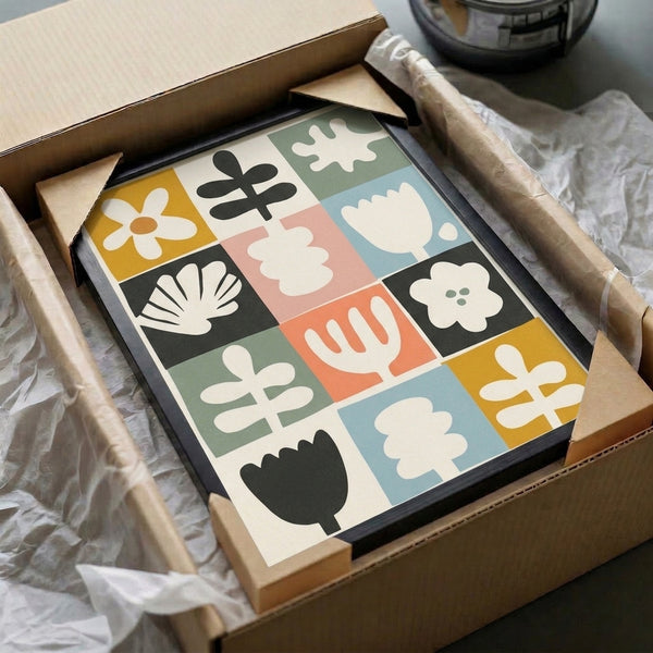 Cheerful minimalist flower print with mid-century design aesthetic showing tulips and leafy shapes in dusty green, coral, and cream palette.