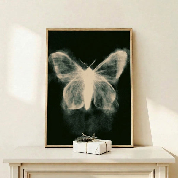 Framed black and pale gray line drawing of butterfly wings with a contemplative, modern minimalist style suitable for zen home décor.