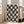 Minimalist framed poster featuring graphic cat face illustrations in black and white arranged in a checkerboard grid with a modern, whimsical aesthetic.