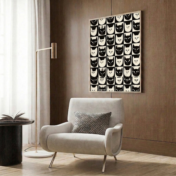 Black and cream checkerboard poster displaying multiple stylized cat faces in a playful, minimalist retro design suitable for contemporary wall decor.