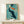 Japanese-style art print depicting elegant koi fish rendered in muted teal, orange, and cream tones with meditative minimalist brushwork on a navy background.