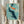 Serene watercolor-style wall art of koi fish in an abstract aquatic setting, blending Japanese artistic traditions with contemporary minimalist design in soothing teal and cream tones.
