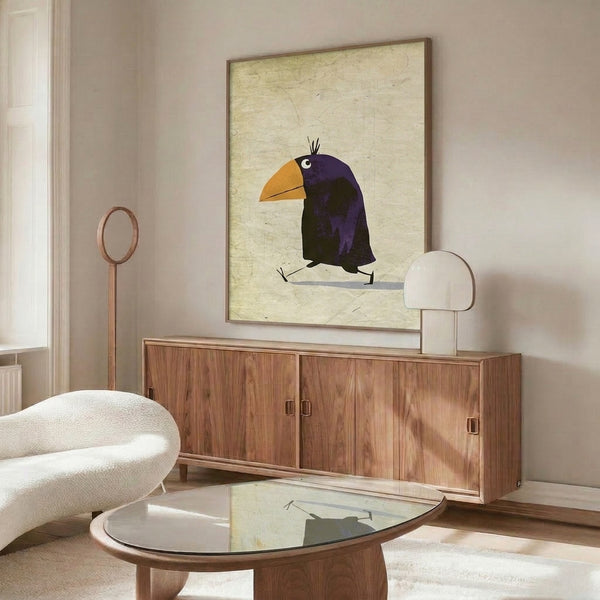 Minimalist raven art print in a modern style featuring bold navy blue and golden yellow elements on a neutral cream canvas, framed on the wall.