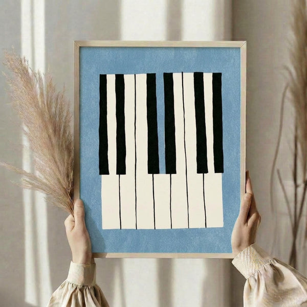 Modern wall art print with simplified piano keys in a calm, sophisticated color palette of slate blue and cream against a neutral background.