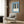 Framed minimalist music poster displaying an abstract piano keyboard in slate blue tones with geometric, contemporary styling for home decor.
