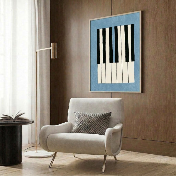 Framed minimalist music poster displaying an abstract piano keyboard in slate blue tones with geometric, contemporary styling for home decor.