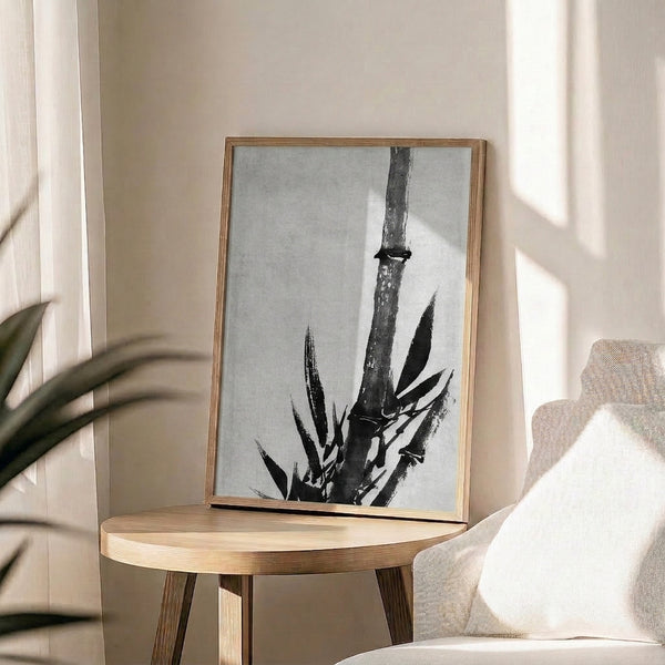 Monochromatic framed poster showcasing a refined bamboo shoot with layered leaves and a small reptile, capturing the essence of minimalist East Asian ink art.