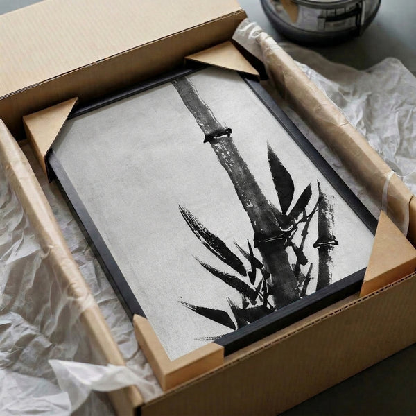 Contemplative sumi-e-inspired artwork depicting bamboo growth with naturalistic detail of leaves and lizard, rendered in restrained grayscale tones as a framed print.