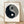 Minimalist yin yang symbol rendered in black ink wash on cream background, creating a balanced and contemplative abstract composition.