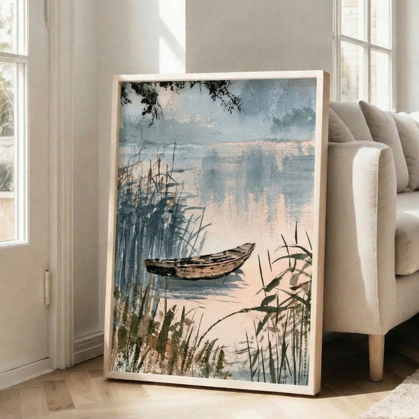 Japandi-inspired watercolor art print of a peaceful lake scene with a boat nestled among delicate reeds under a hazy, contemplative atmosphere in cool greys and creams.