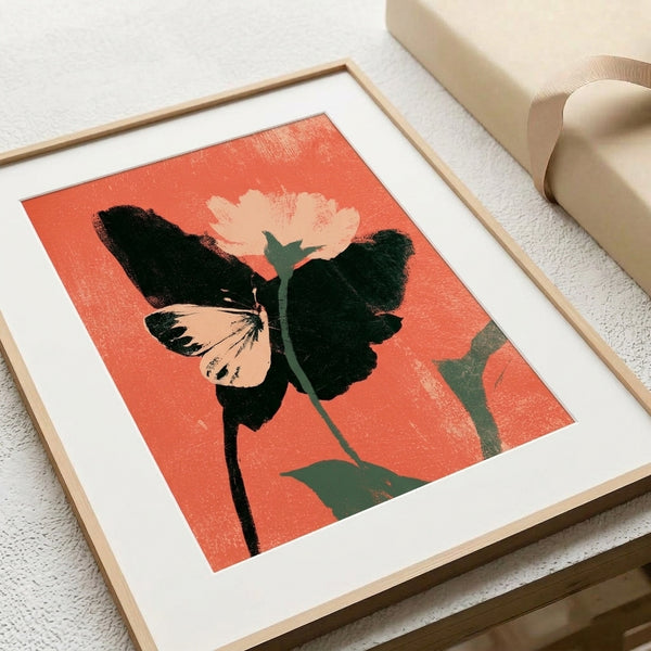 Bold yet serene framed poster showcasing a stylized coral butterfly with botanical design elements in cream, teal, and black, embodying contemporary minimalist aesthetics.