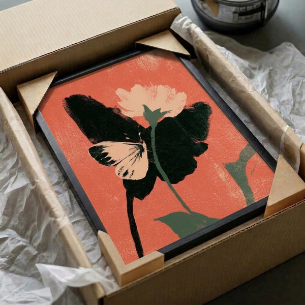 Sophisticated botanical wall art featuring a coral-toned butterfly with abstract plant forms in cream, teal green, and black, framed as modern home decor.