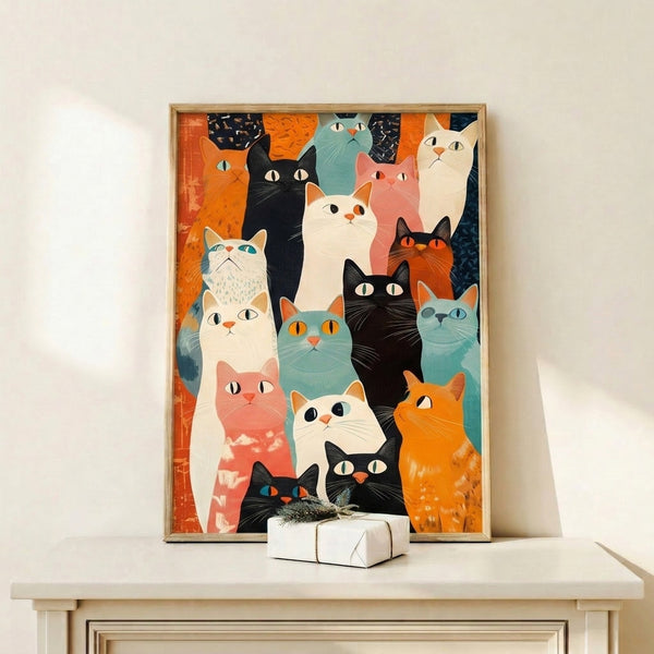 Framed poster displaying stylized cats with striking orange, coral, and teal coloring in a playful retro line art composition.