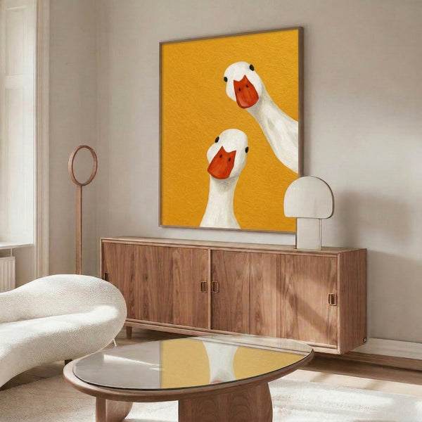Contemporary minimalist poster featuring two ducks with cheerful golden yellow and black detailing, modern home decor with playful charm.