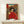 Woodblock-style wall art featuring a geisha in rich red and cream hues amid temple and urban elements, capturing rebellious energy within classical Japanese aesthetic traditions.