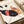 Playful framed wall art depicting a black cat with soda bottles rendered in contemporary pop art style with cream, red, orange, and blue color blocking.
