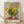 Impressionist oil painting of sunflowers in a vase with golden yellow blooms, sage green stems, and soft cream background, evoking serene warmth and natural beauty.