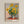 Framed Monet-style sunflower bouquet featuring vibrant golden tones against muted sage and cream hues, capturing the luminous quality of Impressionist floral art.