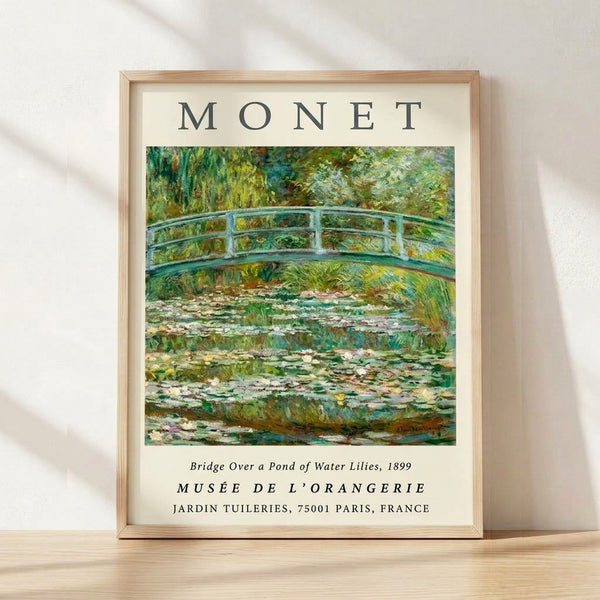 Serene impressionist painting of an arched bridge spanning a pond dotted with water lilies, rendered in soft greens, blues, and golden yellows, framed as a vintage art print.