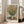 Framed impressionist poster of blooming jerusalem artichokes in cream and golden hues, capturing luminous light and contemplative beauty through soft color harmony.