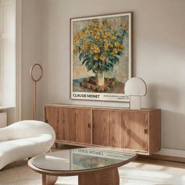 Monet-style framed print of jerusalem artichoke blooms in warm golden and cream tones with contemplative impressionist brushwork and soft blue accents.