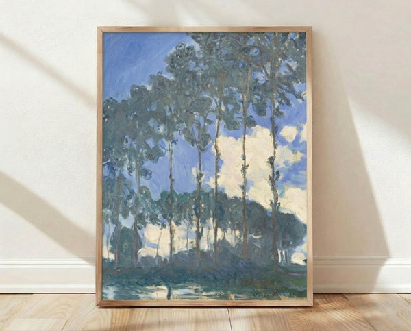 Framed Impressionist landscape painting of tall poplar trees reflected in the Epte River, rendered in soft blues, greens, and warm earth tones with loose brushwork.