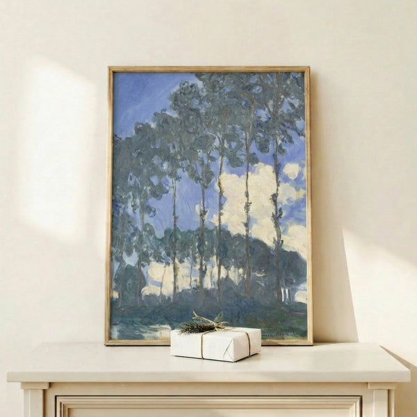 Framed art print showing Monet's iconic poplar trees rising above the Epte's calm waters, painted in atmospheric blues and greens with impressionistic soft edges.