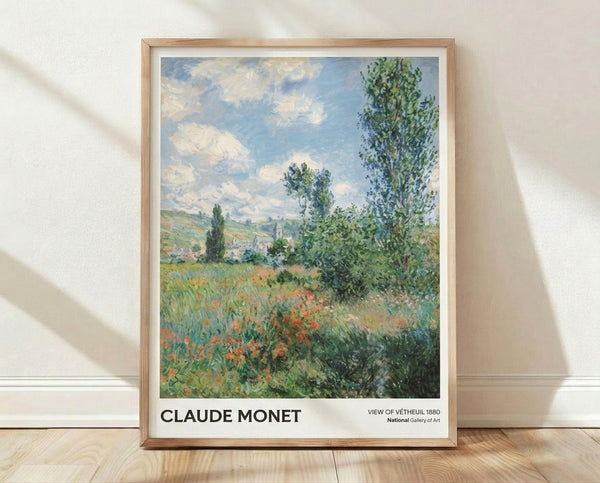 Impressionist landscape painting of Vetheuil village with poplar trees, green fields, and red poppies under a luminous blue sky with soft clouds, rendered in serene watercolor tones.