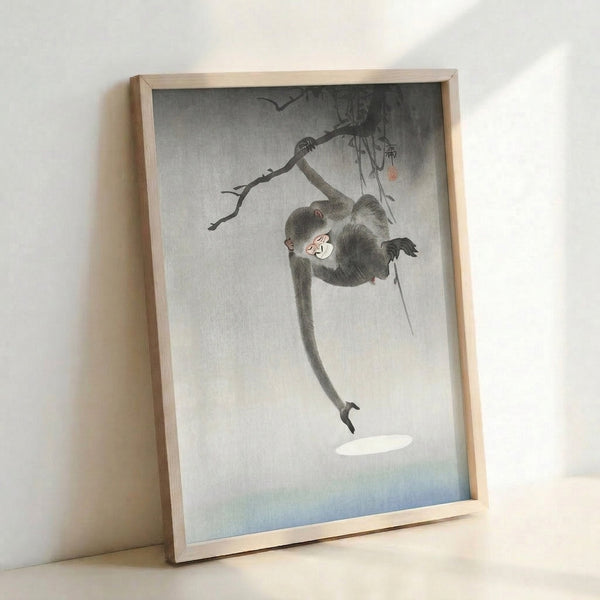 Minimalist Japanese woodblock art of a monkey grasping a branch, combining traditional printmaking technique with calming neutral tones and gentle playful energy.