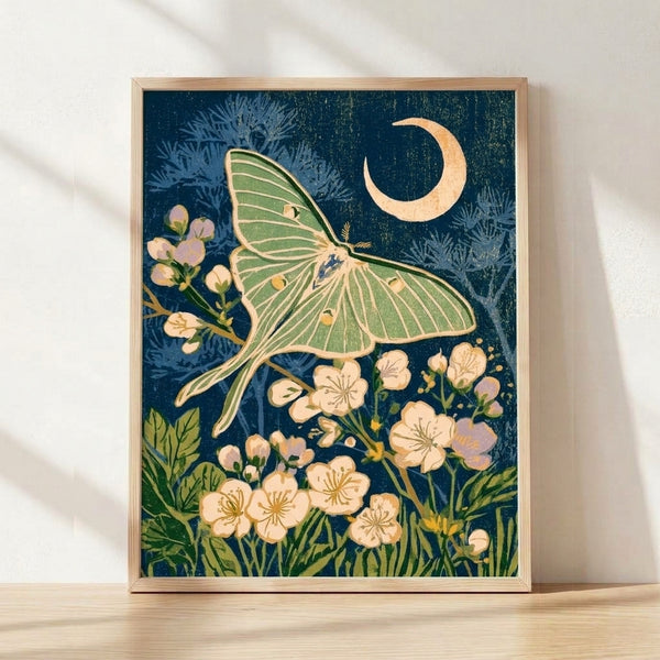 Art Nouveau framed poster featuring a luna moth among night-blooming flowers and ferns in teal, cream, and gold tones, evoking dreamy nocturnal magic.