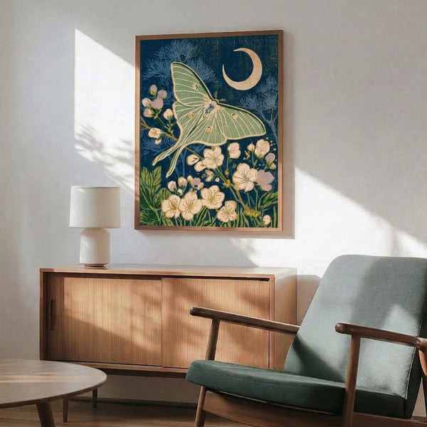 Japandi-inspired wall art print with an ethereal luna moth surrounded by crescent moon motifs, soft green botanicals, and lavender accents in a vintage style.