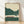 Minimalist line art poster of a vintage red train traveling through forested mountains with a serene, nostalgic aesthetic in cream, forest green, and burgundy tones.
