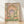 Serene Mughal architectural scene with an ornate archway framing a dome and palace courtyard, rendered in soft rose pink, sage green, and cream tones with Art Nouveau flourishes and botanical details.