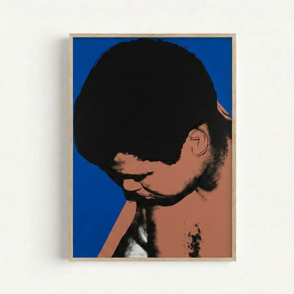 Warhol-style Muhammad Ali print featuring bright contrasting hues and repeated color blocking, modern wall art.