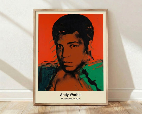 Bold pop art portrait of Muhammad Ali in vibrant colors with black and gold tones, capturing the boxer's iconic presence in modern Warhol style.