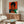 Striking pop art print of boxer Muhammad Ali rendered in bold color blocking with black, gold, and fluorescent accents on a clean white background.