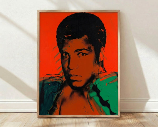 Pop art portrait of Muhammad Ali in vibrant color blocks and bold outlines, framed poster showcasing iconic Warhol-style graphic design.