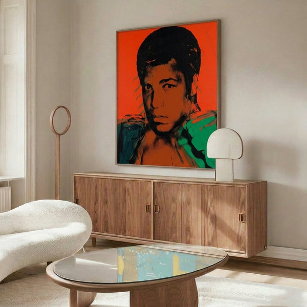 Muhammad Ali rendered in bold pop art style with striking color combinations and flat graphic shapes, framed as modern art poster.