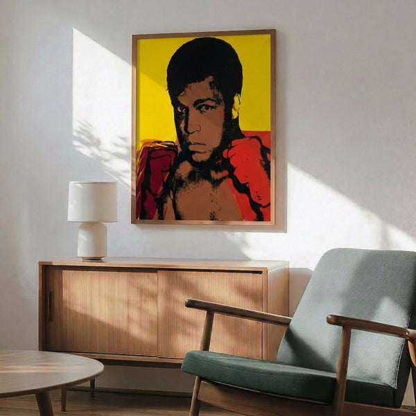 Framed pop art poster of Muhammad Ali rendered in rich, contrasting colors with screen-print technique and modern artistic flair.