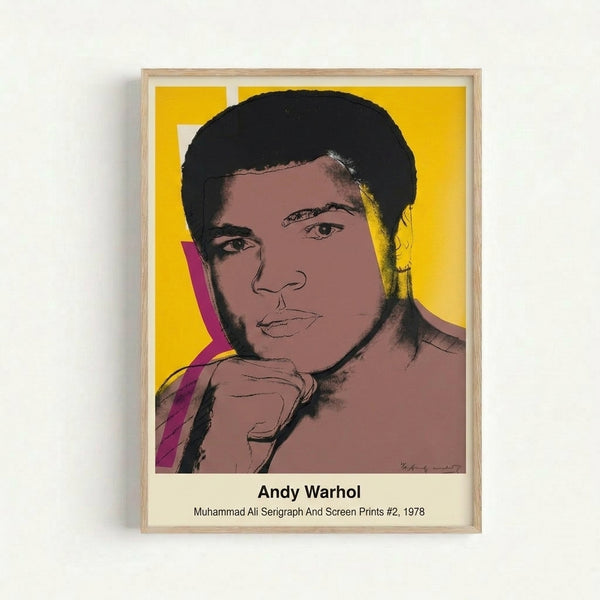 Iconic Warhol-inspired serigraph of boxer Muhammad Ali with striking color blocking in bright yellow and red tones, displayed as a framed art print.