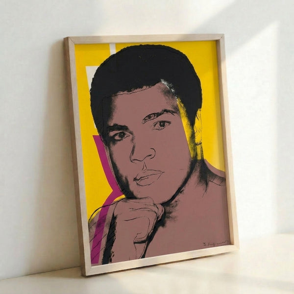 Pop art screen print of Muhammad Ali rendered in striking jewel tones and bold graphic shapes, capturing the boxer's powerful presence in modern artistic style.