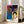 Framed pop art print depicting the legendary boxer Muhammad Ali with fists raised, featuring Warhol's signature bold graphic style in black, white, and brilliant accent colors.
